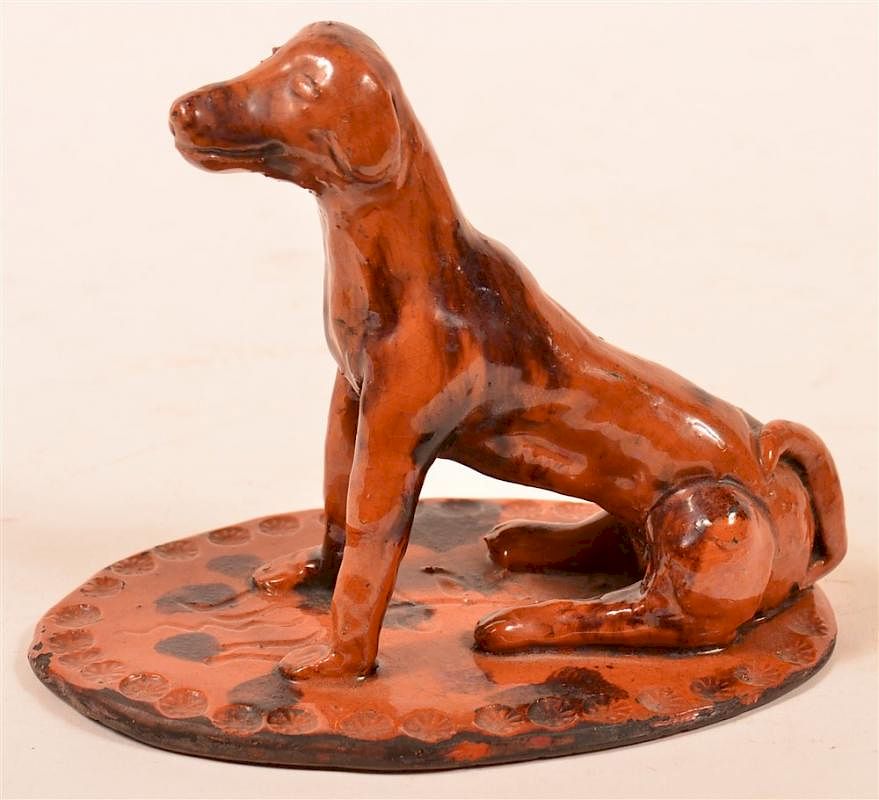 Appraisal: Rare Shooner Redware Figure of a Seated Dog Rare Shooner