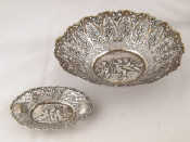 Appraisal: A cast openwork silver bowl amorini at play in the