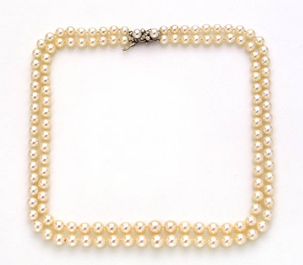 Appraisal: A cultured pearl diamond and k white gold double strand