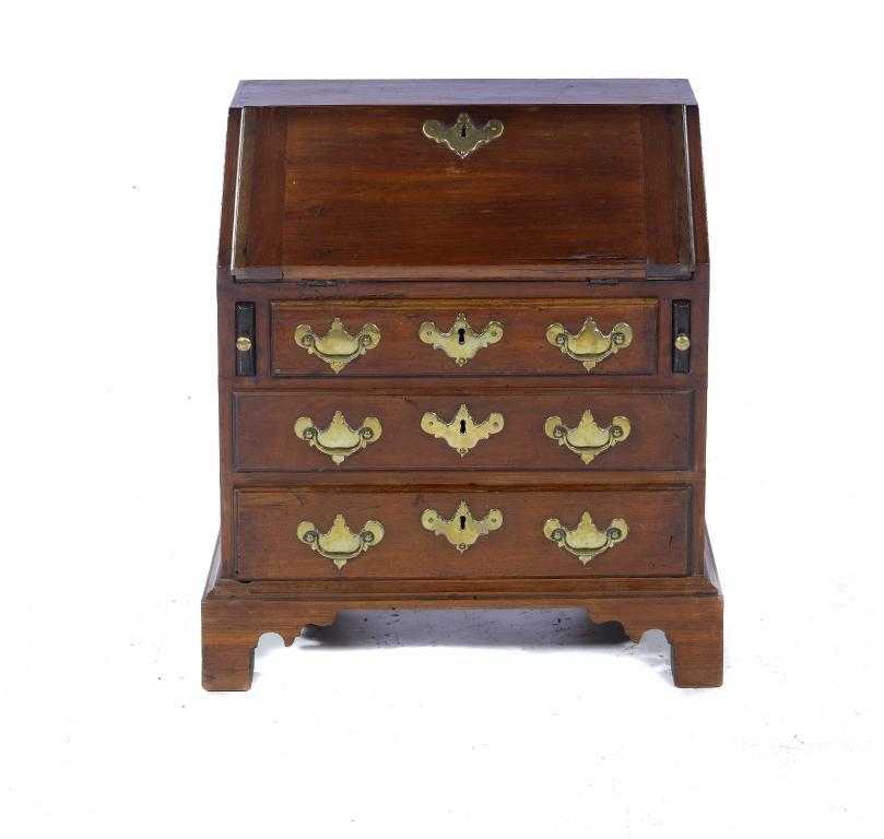 Appraisal: A MINIATURE BUREAU POSSIBLY NORTH AMERICAN of fruit or other