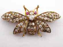 Appraisal: A yellow metal tests carat gold diamond and ruby butterfly