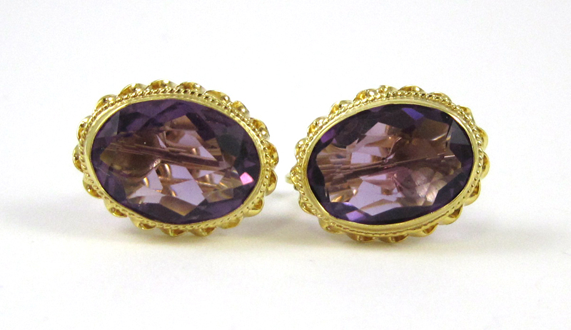 Appraisal: PAIR OF AMETHYST CLIP-ON EARRINGS Each K yellow gold screw