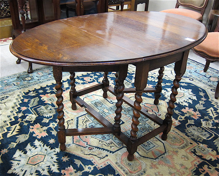 Appraisal: AN OAK DROP-LEAF BREAKFAST TABLE English early th century the