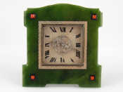 Appraisal: Cartier A nephrite jade onyx coral and diamond clock the