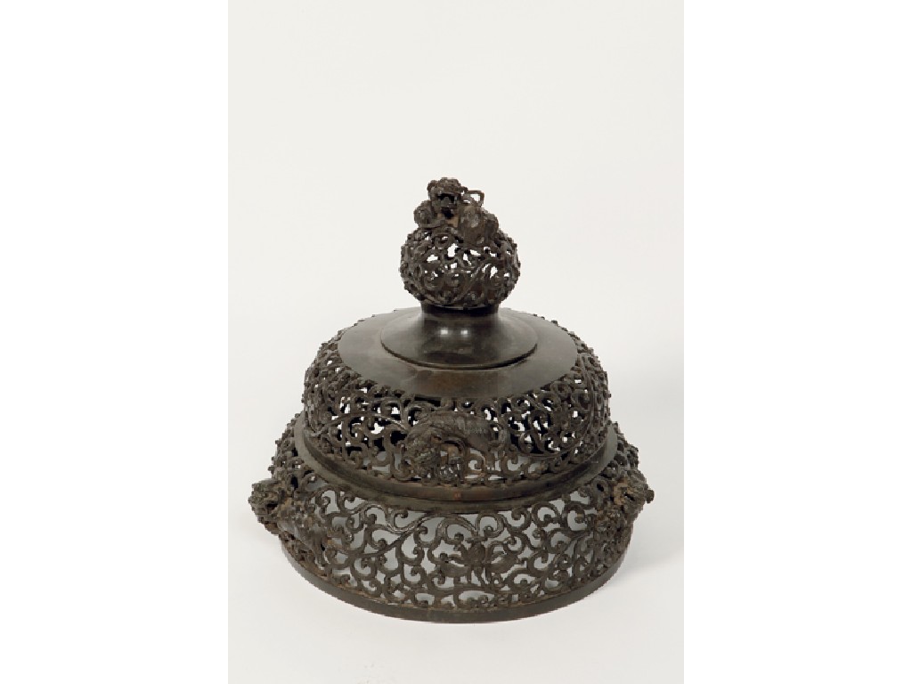 Appraisal: A CHINESE BRONZE LID from a censer pierced and chased