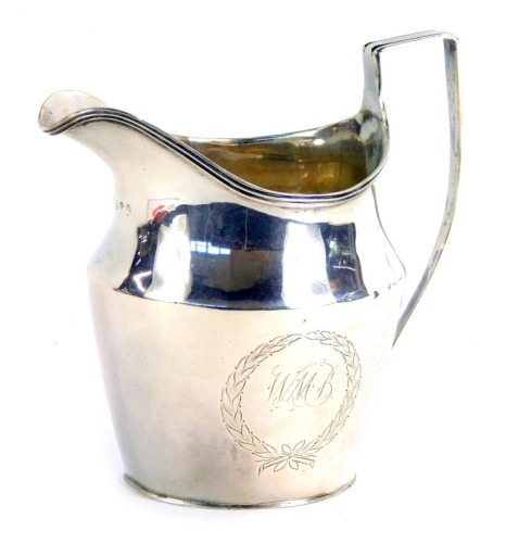 Appraisal: A George III silver cream jug with a shaped and