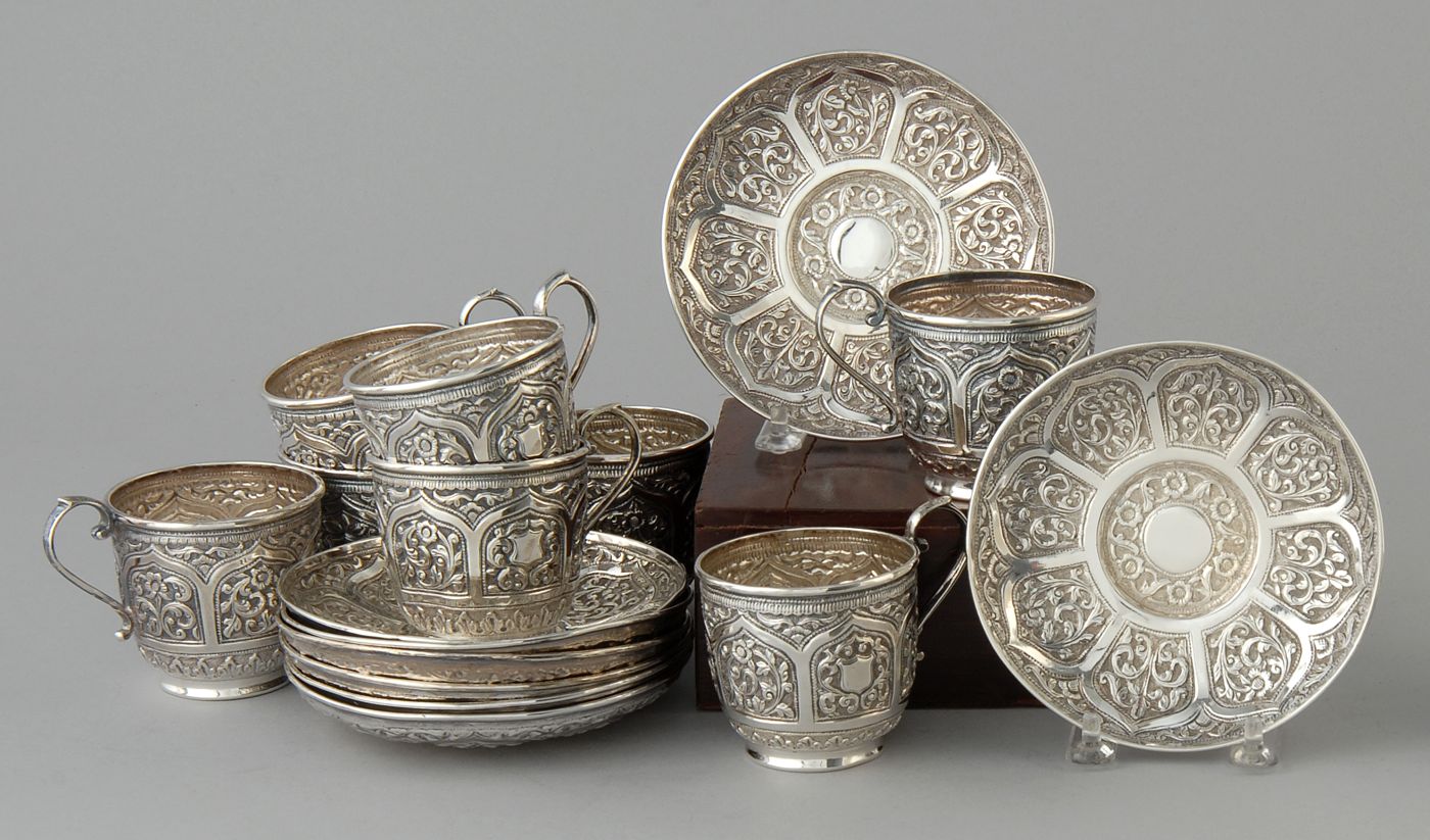 Appraisal: EIGHT CHINESE EXPORT SILVER CUPS AND SAUCERS Circa With ornate