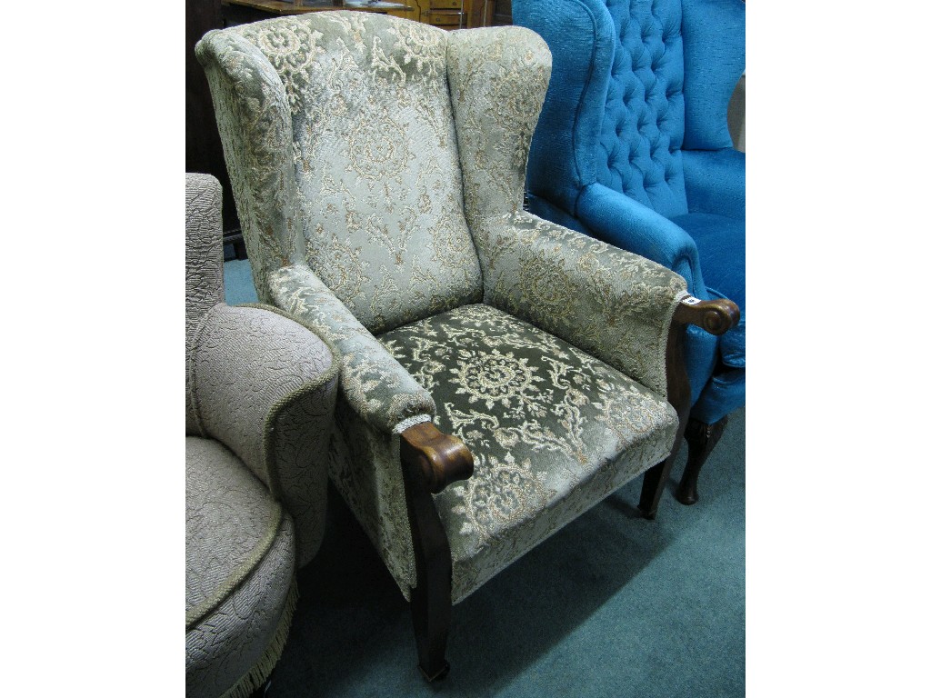 Appraisal: Upholstered wingback armchair