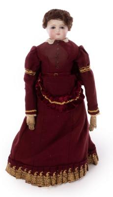 Appraisal: A French bisque head fashionable doll with chamois body and