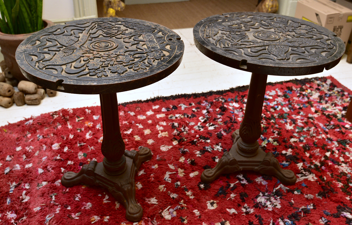 Appraisal: A PAIR OF JAPANESE CAST IRON SIDE TABLES WITH DECORATED