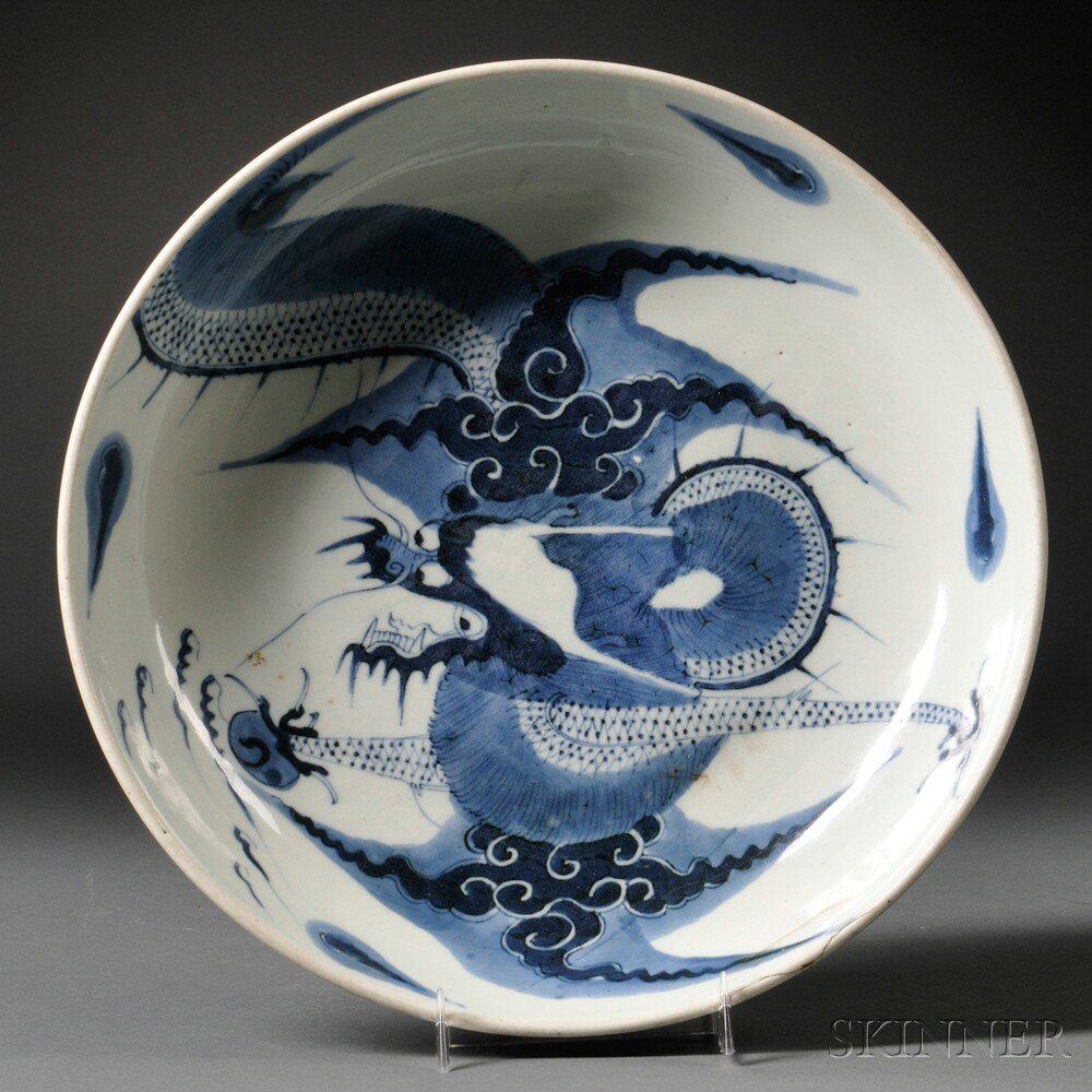 Appraisal: Blue and White Plate China th century depicting a four-clawed