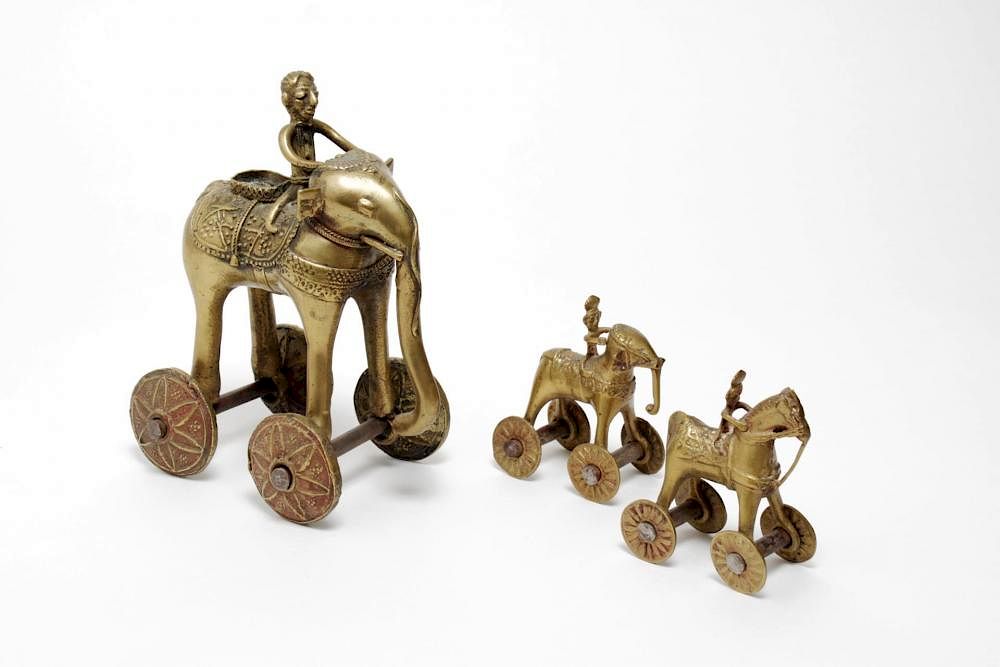 Appraisal: Indian Cast Brass Elephant Horse Pull Toys Indian brass pull