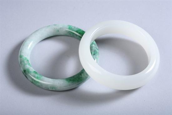 Appraisal: CHINESE WHITE AND APPLE GREEN JADE BRACELETS