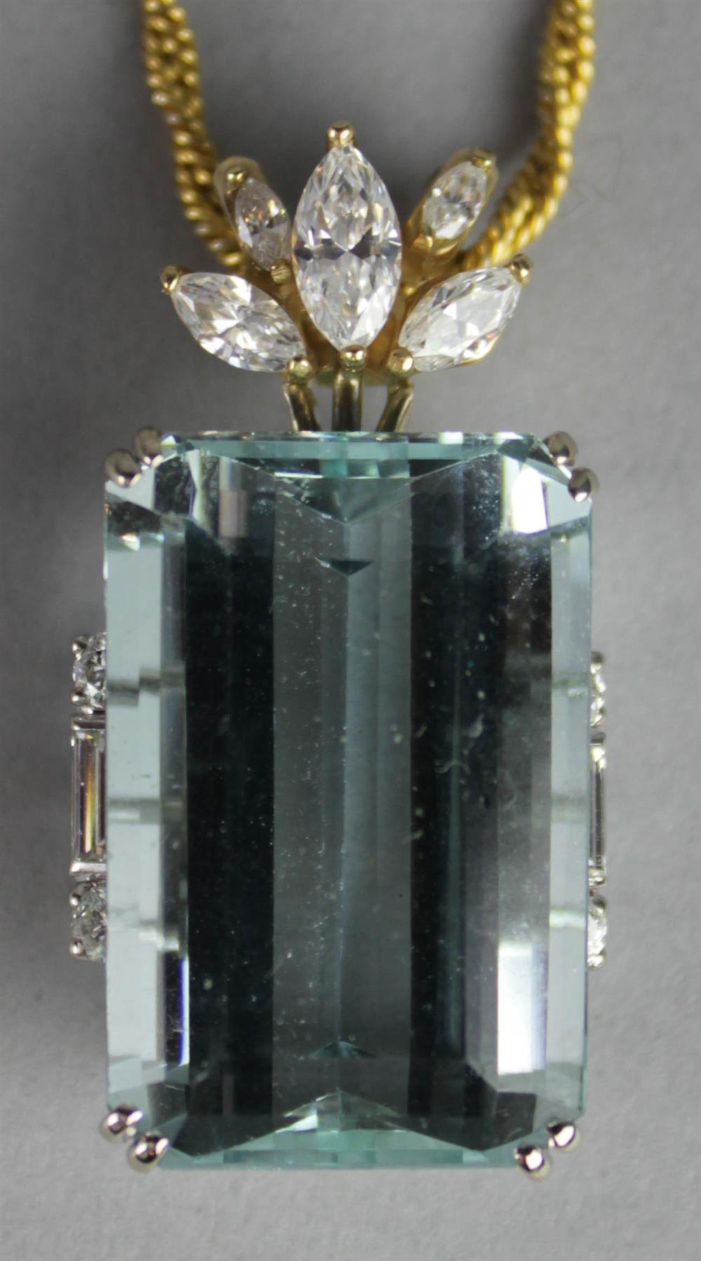 Appraisal: LADY'S AQUAMARINE PENDANT the large emerald cut central stone measuring