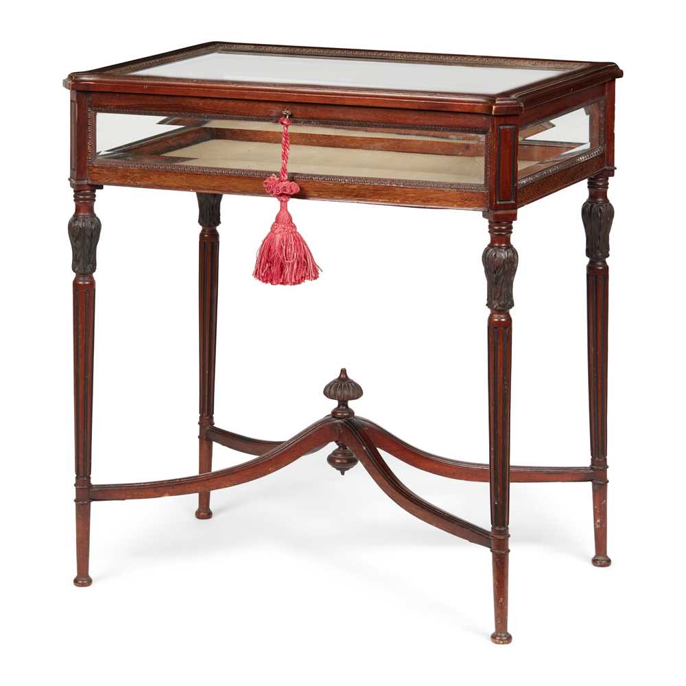 Appraisal: EDWARDIAN MAHOGANY BIJOUTERIE TABLE EARLY TH CENTURY the hinged glazed