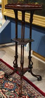 Appraisal: George III mahogany torchere circa having a scalloped rim above