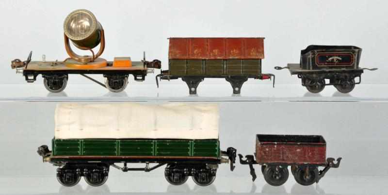 Appraisal: Lot of Miscellaneous Train Items German Includes four freight cars