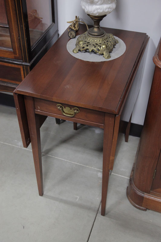 Appraisal: PAIR OF HENKEL-HARRIS DROP LEAF STANDS Cherry with rectangular leaves