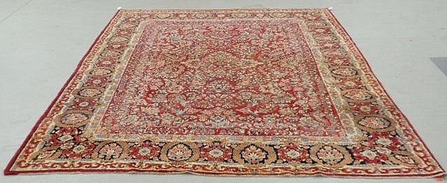 Appraisal: Sarouk oriental carpet red field and overall floral patterns x