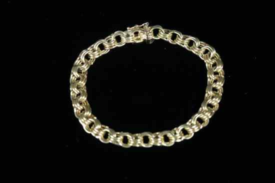 Appraisal: K YELLOW GOLD TRIPLE-ROUND LINK FLEXIBLE CHAIN BRACELET Tongue-and-groove box