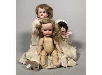 Appraisal: Three antique bisque head dolls including one Armand Marseille sleep