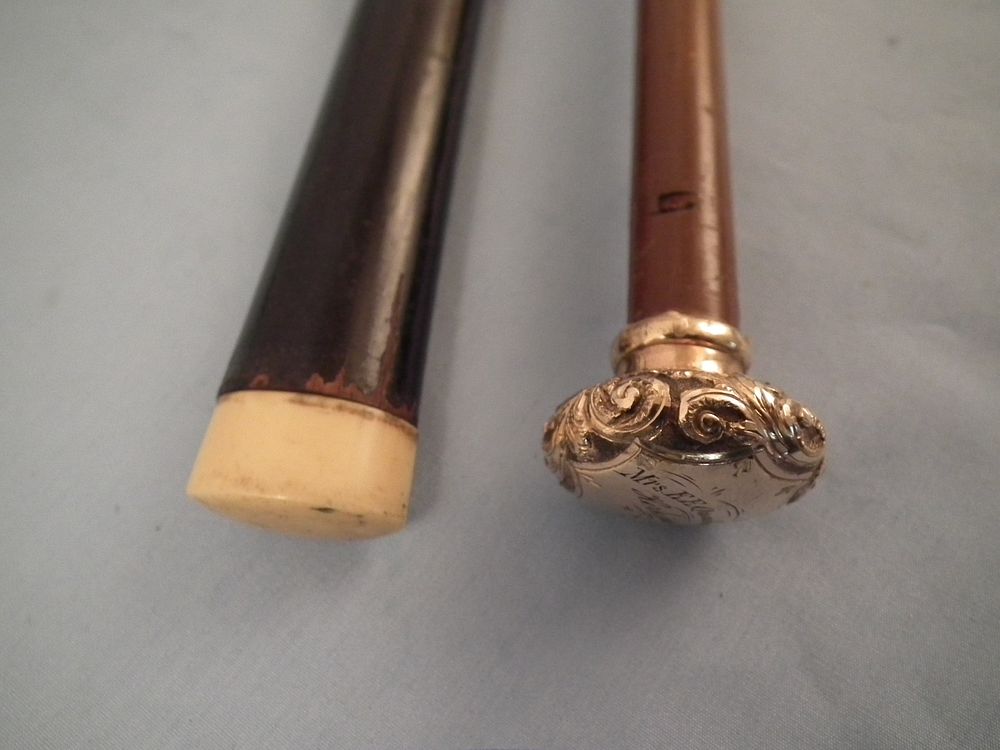 Appraisal: ANTIQUE CANES Lot of antique canes fancy gold filled knob