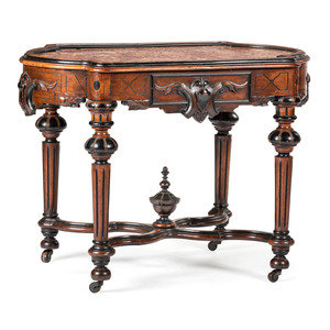 Appraisal: A Victorian Carved Walnut Marble-Top Table Circa s Height x