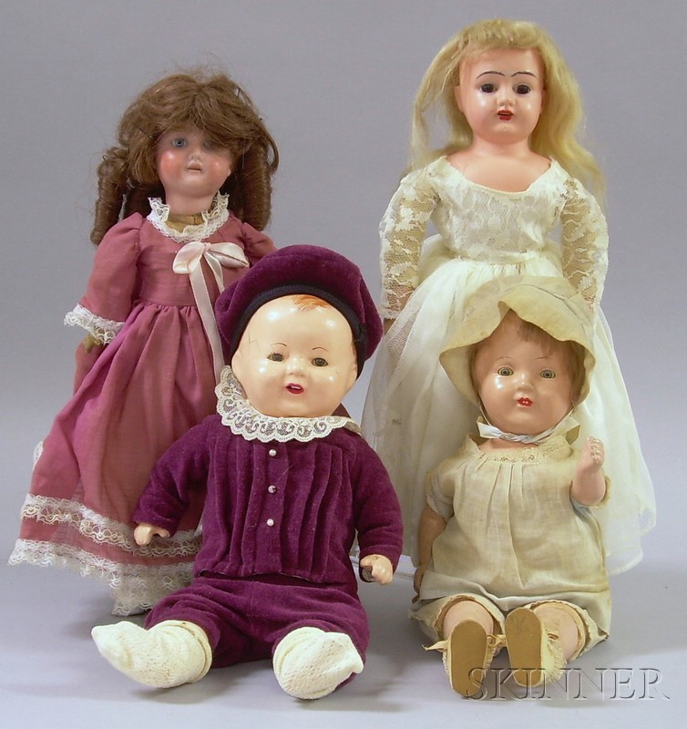 Appraisal: Four Dolls a German doll with red and white dress