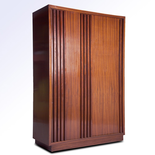 Appraisal: ANDRE SORNAY Mahogany wardrobe with two sliding doors concealing one