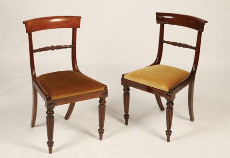 Appraisal: A SET OF FOUR REGENCY MAHOGANY DINING CHAIRS with scrolling