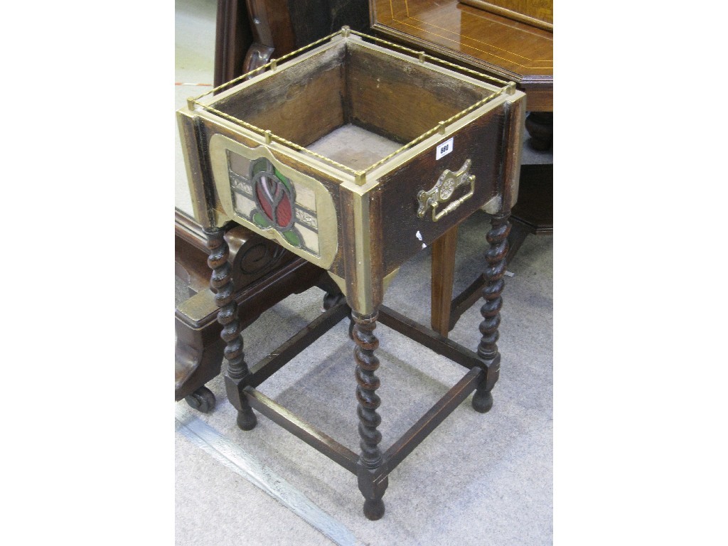 Appraisal: Oak and brass mounted plantstand with leaded glass panel on