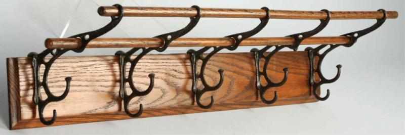 Appraisal: Oak Metal Coat Hat Rack With five hooks Condition Excellent