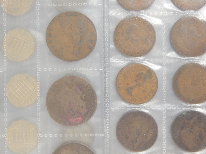 Appraisal: An album of coins to include pennies threepennies six pences