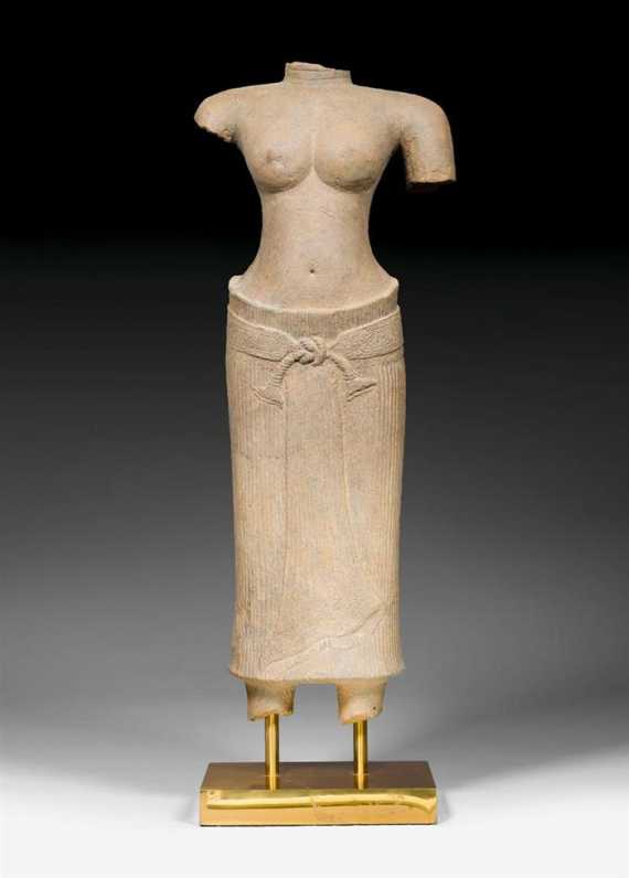 Appraisal: A FINE GREY STONE TORSO OF A FEMALE DEITY Khmer