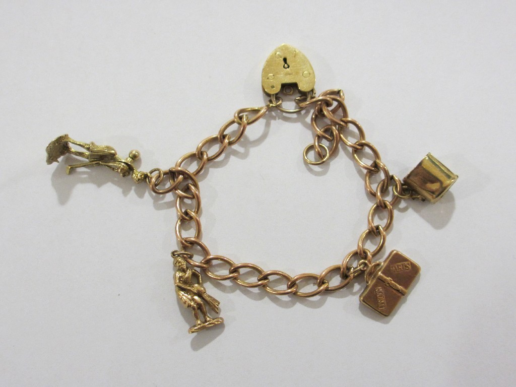 Appraisal: Nine carat gold charm bracelet Approximately gms