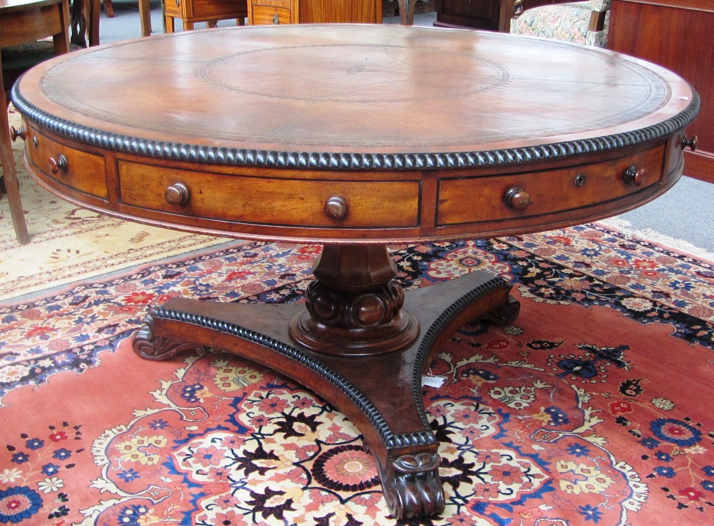 Appraisal: A William IV mahogany drum table the leather inset circular