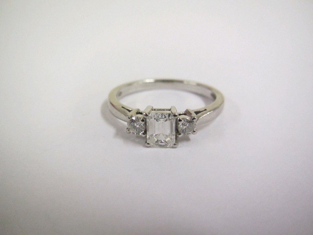 Appraisal: Platinum diamond three stone ring with princess cut diamond flanked