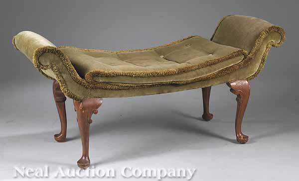 Appraisal: A George III-Style Mahogany and Upholstered Bench with flared scrolled