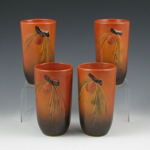 Appraisal: Four Roseville Pine Cone tumblers in brown Marked Roseville USA