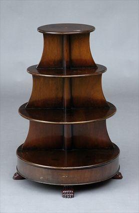 Appraisal: REGENCY MAHOGANY WHATNOT The four-tier circular main body raised on