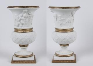 Appraisal: PAIR OF BLANC DE CHENE GILT BRONZE MOUNTED SEVRES URNS