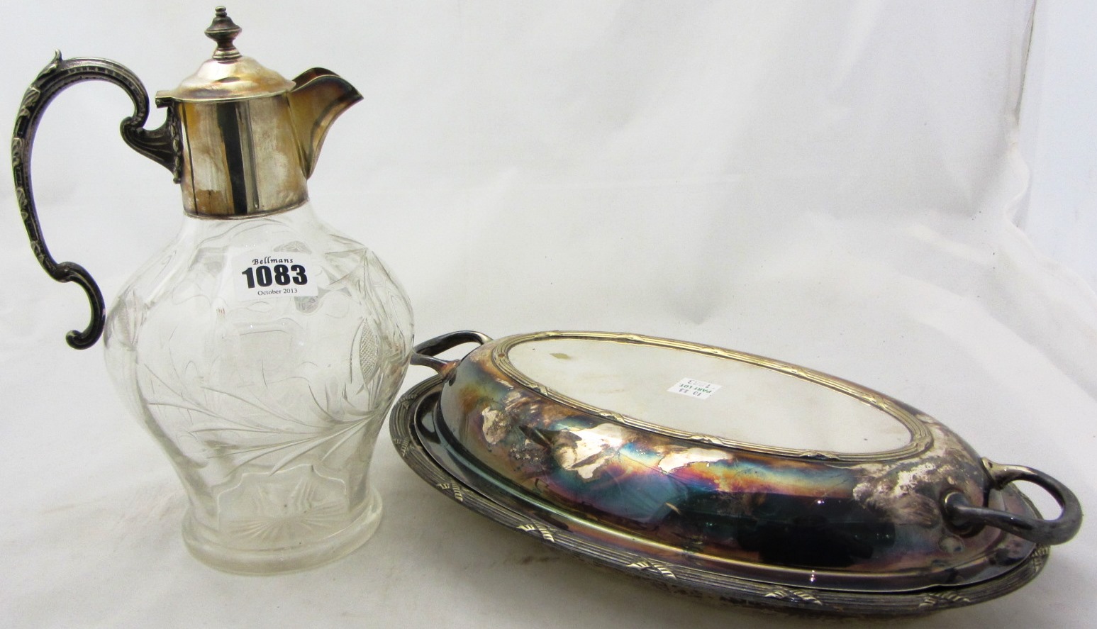 Appraisal: Plated wares comprising a glass claret jug the cast handle