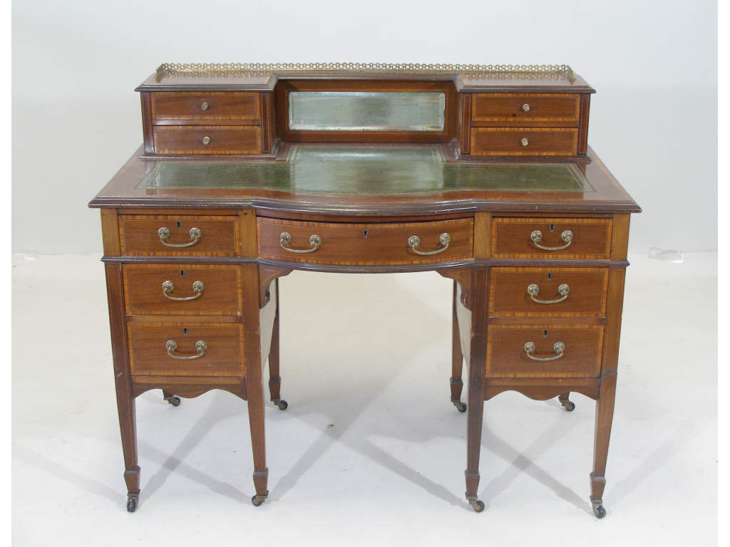 Appraisal: Diminutive Writing Desk Edwardian c kneehole form mahogany and mahogany