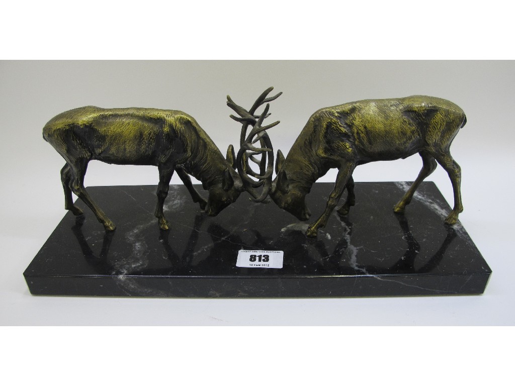 Appraisal: Pair of Spelter fighting deers on black marble base