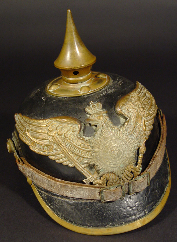 Appraisal: Prussian Pickelhaube military helmet with leather strap and brass fittings