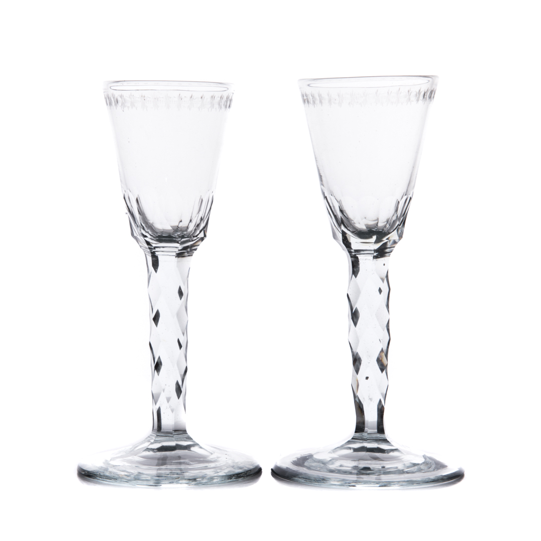 Appraisal: Pair continental blown and cut glass wine stems th century