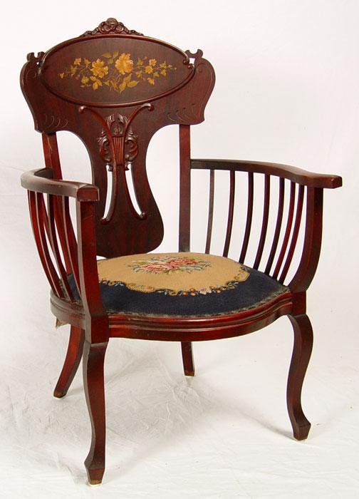 Appraisal: ART NOUVEAU MAHOGANY ARM CHAIR Carved crest barrel form chair