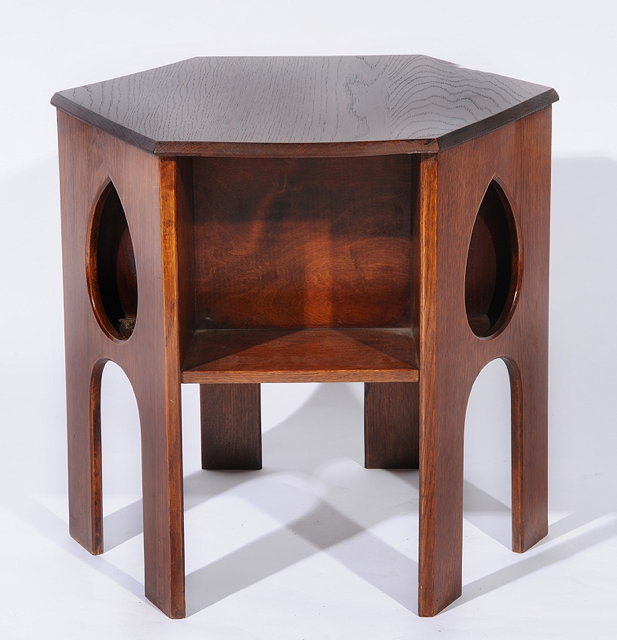 Appraisal: AN ARTS AND CRAFTS OAK HEXAGONAL OCCASIONAL TABLE with spade