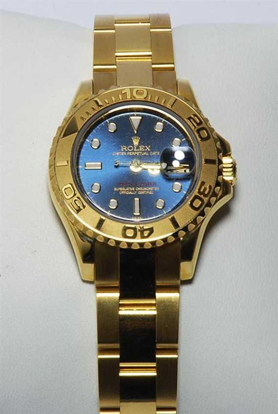 Appraisal: LADY'S WRISTWATCH ROLEX YACHT MASTER Yellow gold Round case No