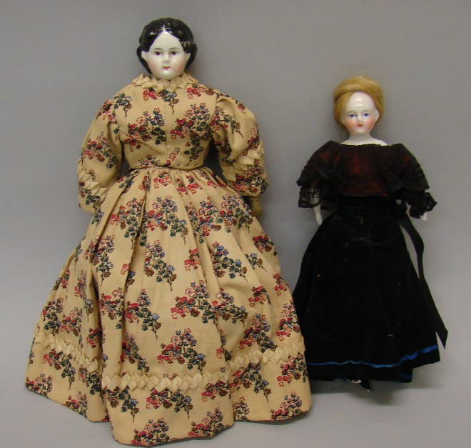 Appraisal: Pair of china dolls Solid dome doll with honey blonde